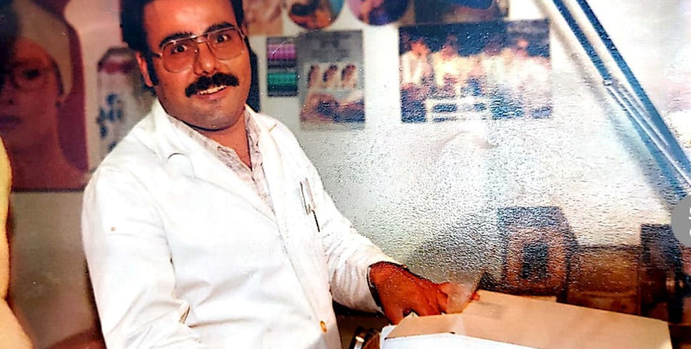 1975, Dad with a classic mustache look, while edging glasses